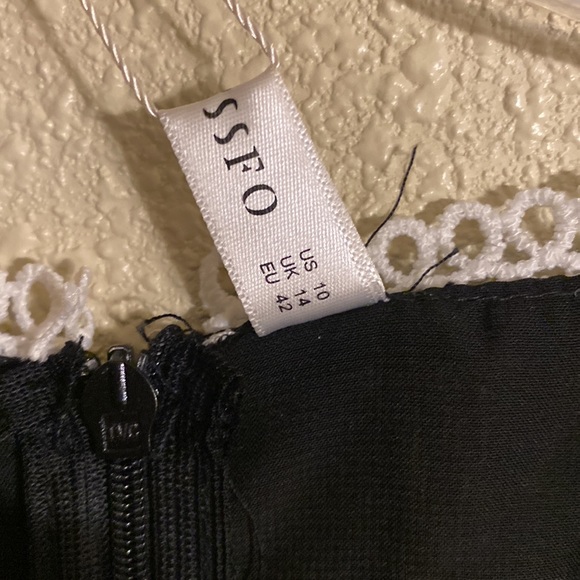 Black Dress with White Lace Cutout Sections Size 10 - Picture 6 of 13